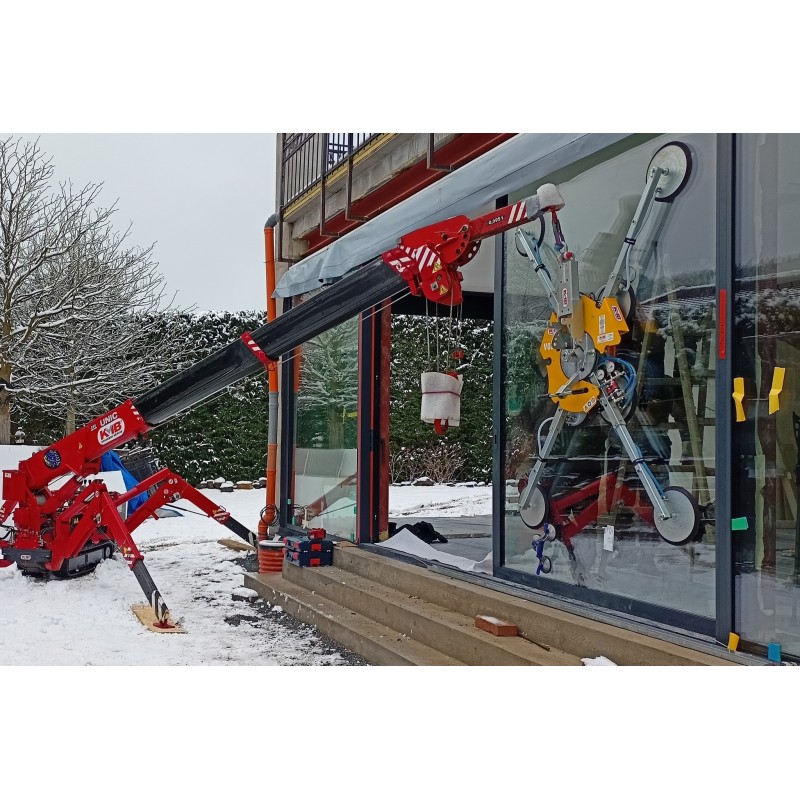 Mini grue avec palonnier à ventouse autonome 800 Kg sur chantier - PALVAC